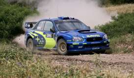 Subaru  - Impreza WRC 2004 blue/yellow - 1:18 - SunStar - 4369 - sun4369 | Toms Modelautos